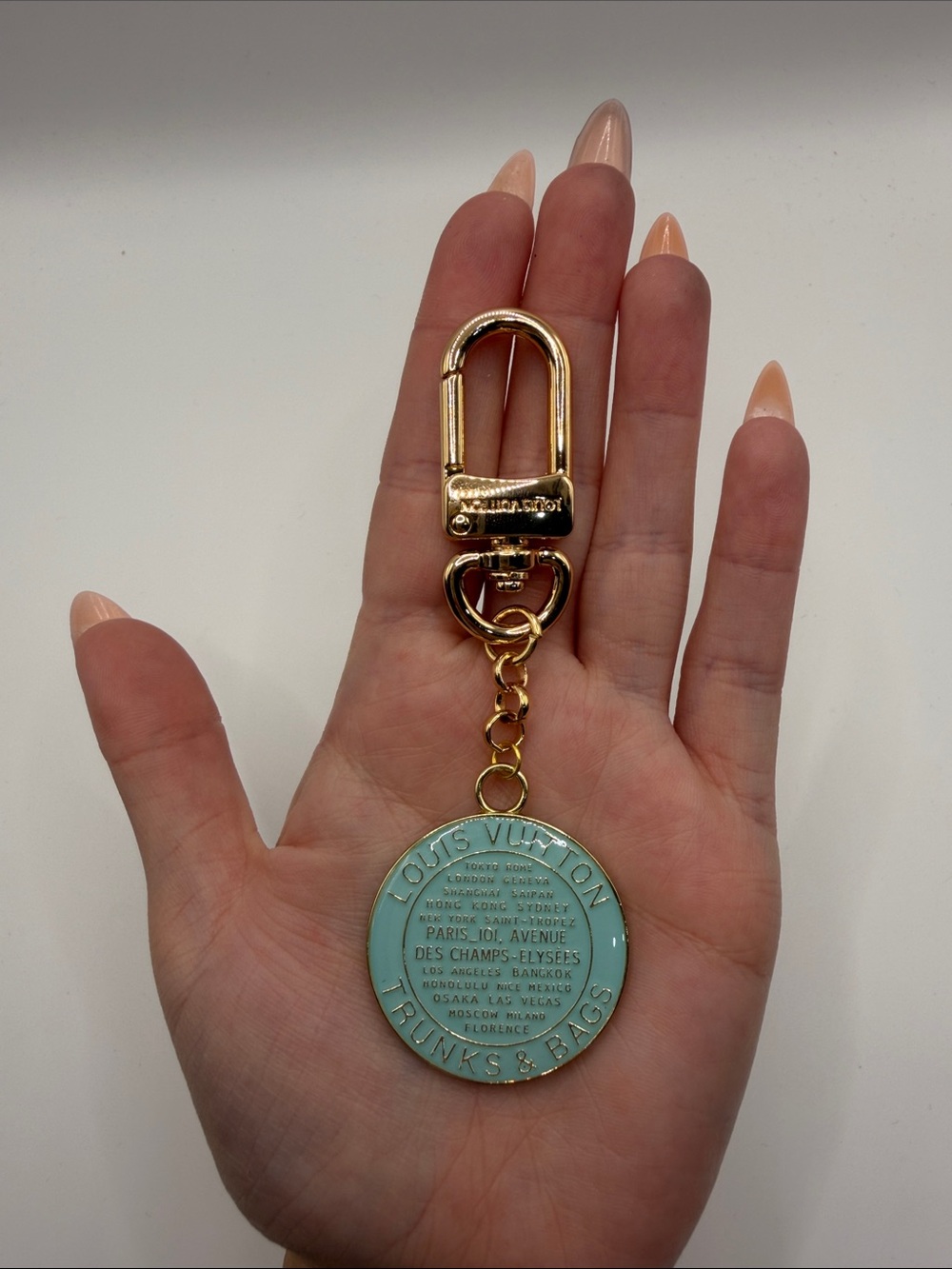 1489. Gold and Teal Round Keychain Charm